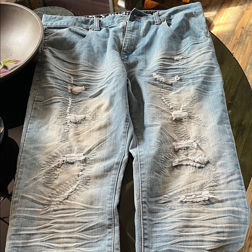 Distressed Light Blue Jeans